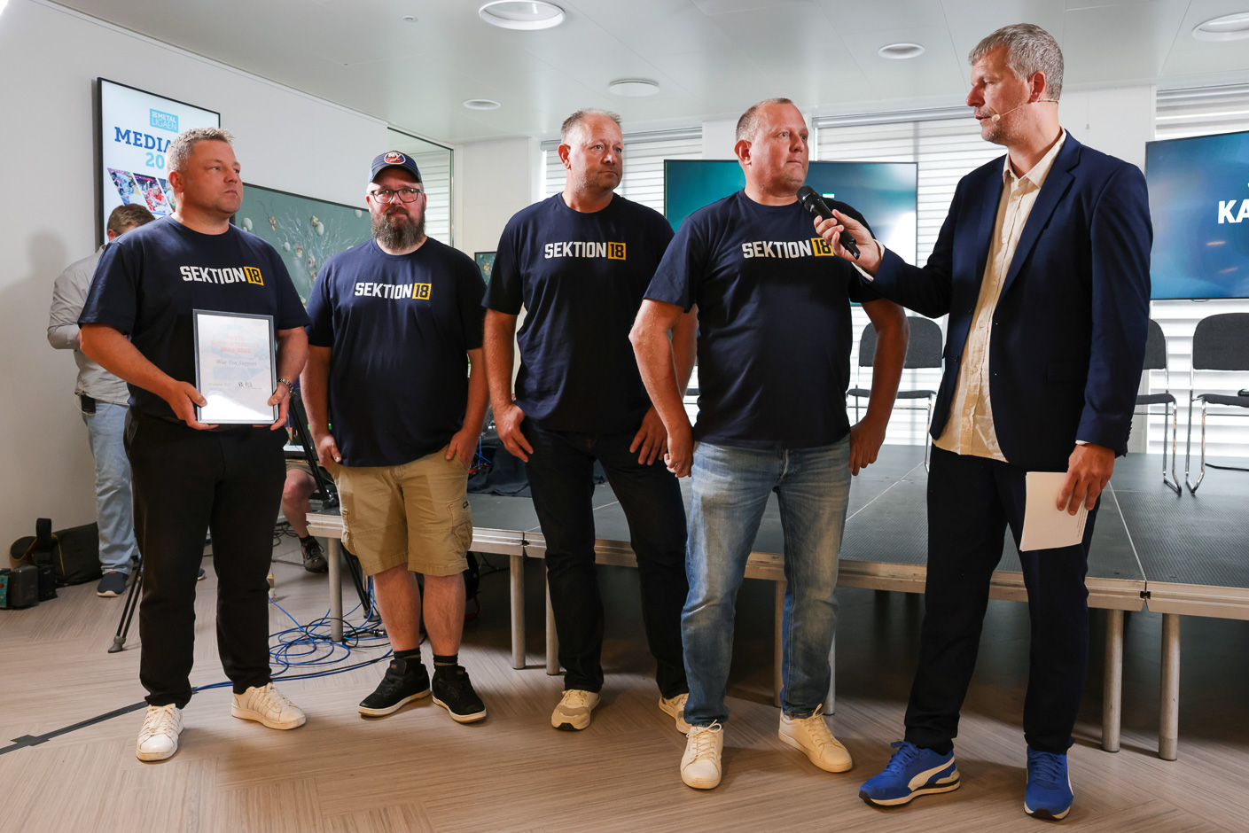 Formand Kim Torp Jensen og makkerne fra Sektion modtog i går Søren Stockfisch-prisen på ligaens Media Day. 